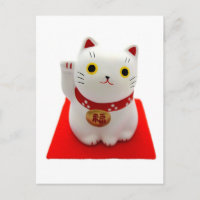 White Maneki Neko on a Red Carpet