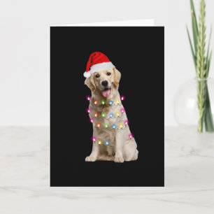 Carte retriever doré assis avec noël