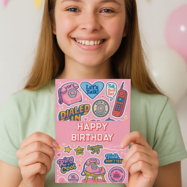 Carte “Ring Ring ! Les filles, joyeux anniversaire (Teen girl smiling and holding pink retro birthday card with vintage phones, speech bubbles,)