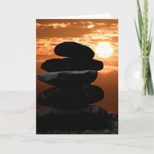 Carte rock cairn witsunset sky