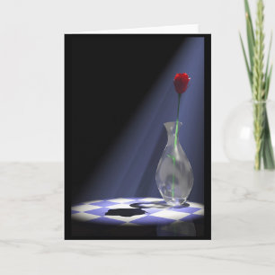 Carte rose dans un vase