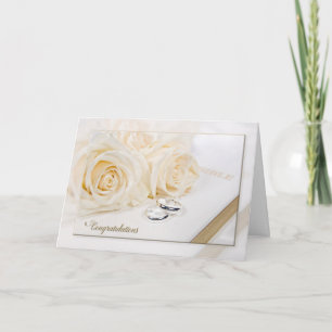 Carte roses mariages et anneaux de réflexion