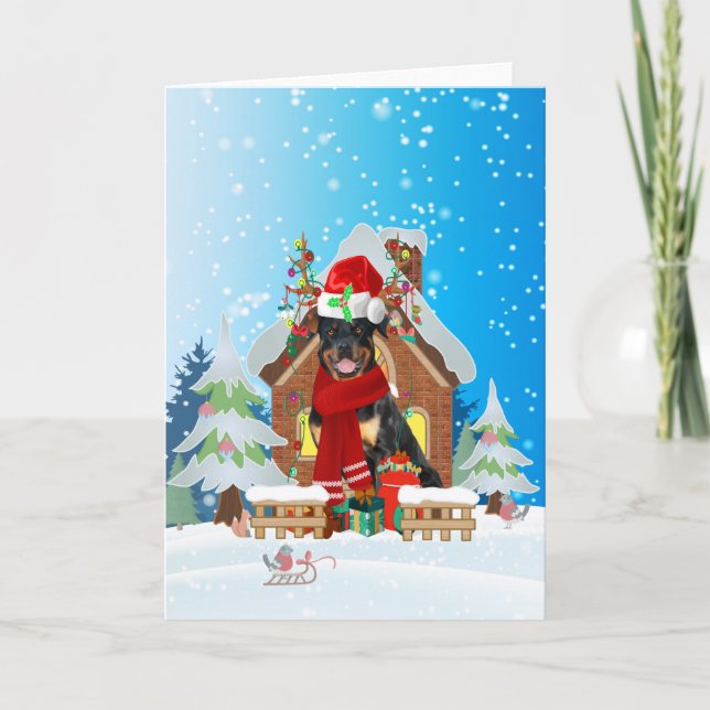 Carte Rottweiler dans la neige avec des cadeaux de Noël  (Devant)