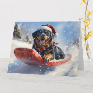 Carte Rottweiler en traîneau 'Qu'il neige' Noël