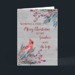 Carte Rustic Grandson et sa femme Joyeux Noël<br><div class="desc">Joyeux Noël pour petit-fils et sa carte de femme avec aquarelle feuillage,  un cardinal et motif de bois et verset réfléchi.</div>