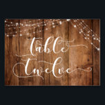 Carte Rustique Brown Bois & Lumières Table Douze<br><div class="desc">Cette suite de designs rustiques et élégants pour mariage et événement présente quelques tendances design mariages populaires combinées de façon fraîche. Avec un riche arrière - plan en bois brun et deux cordes d'accents lumineux scintillants, j'ai combiné une belle police de script moderne pour rendre des graphiques représentant des mots...</div>