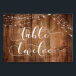 Carte Rustique Brown Bois & Lumières Table Douze<br><div class="desc">Cette suite de designs rustiques et élégants pour mariage et événement présente quelques tendances design mariages populaires combinées de façon fraîche. Avec un riche arrière - plan en bois brun et deux cordes d'accents lumineux scintillants, j'ai combiné une belle police de script moderne pour rendre des graphiques représentant des mots...</div>