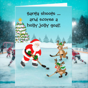 Carte Santa jouant au hockey avec des rennes de Noël