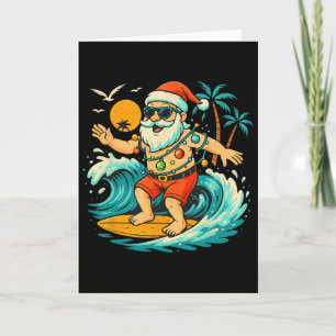 Carte Santa Surfant sur la plage en été Lumières de Noël