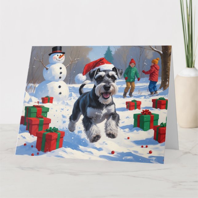 Carte Schnauzer coule en neige avec le Casquette de Noël (Devant)