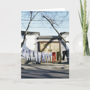 Carte Séchage de blanchisserie sur des cordes à  linge