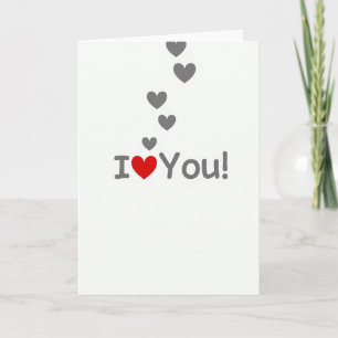 Carte simple « Je t'aime » avec des cœurs flottant