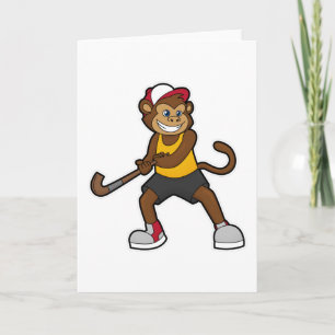 Carte Singe au hockey avec bâton de hockey