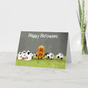 Carte Soccer Happy Halloween avec des boules sur herbe v