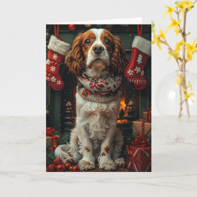 Carte Springer Spaniel avec un cadeau de Noël devant la  (Fleur jaune)