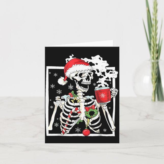 Carte Squelette de Noël avec crâne souriant buvant du ca (Devant)