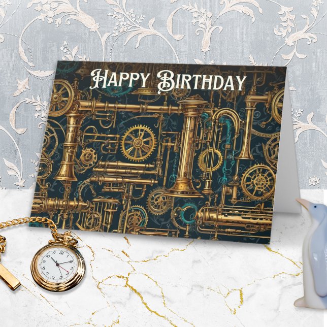 Carte Steampunk Retro Cogs En Métal Gears Bonne Annivers (A Steampunk themed birthday card with metal cogs and pipes, and 'Happy Birthday' in retro lettering)