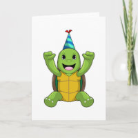 Tortue à l'anniversaire avec chapeau de fête