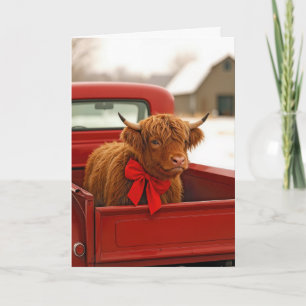 Carte Vache des Highlands à Noël dans un vieux pick-up r