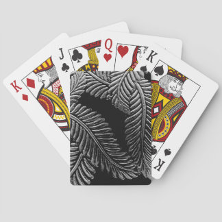 Cartes à jouer aux feuilles noires et blanches