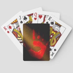 Cartes de jeu classiques de la main rouge