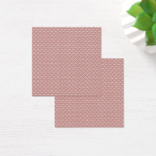 Cartes De Visite Un tapis à motifs rouges et bruns repose sur