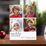 Cartes Pour Fêtes Annuelles 4 Photo Collage - Moderne Joyeux Noël noir<br><div class="desc">Utilisez quatre photos et faites un accueil unique et tendance Joyeux Noël avec un thème noir et blanc. Si vous avez besoin de déplacer quelque chose,  cliquez sur le bouton personnaliser pour apporter des modifications.</div>