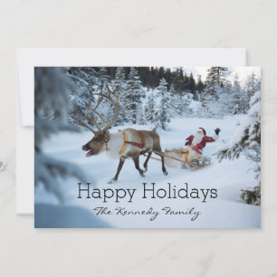 Cartes Pour Fêtes Annuelles A reindeer pulling Santa Claus and his sleigh