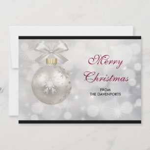 Cartes Pour Fêtes Annuelles Boule de Noël argentée élégante sur lumières Bokeh