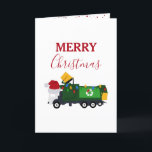 Cartes Pour Fêtes Annuelles Camion de recyclage de Noël<br><div class="desc">Un joli exemple d'un camion à ordures de recyclage de Noël portant un chapeau de Père Noël et décoré de lumières de Noël avec des mots "Joyeux Noël". Une carte de Noël idéale pour les amateurs de camions à ordures,  petits ou grands,  filles ou garçons.</div>