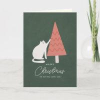 Chat drôle avec un joyeux Noël d'arbre plié