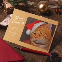 Chat orange drôle de Noël avec chapeau de Père Noë