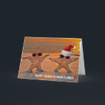 Cartes Pour Fêtes Annuelles Christmas starfish couple on sunset beach<br><div class="desc">pair of tropical starfish on sunset beach with sunglasses and holiday hat</div>