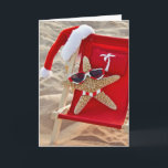 Cartes Pour Fêtes Annuelles Christmas starfish with Santa<br><div class="desc">Starfish in beach chair with Santa a and sunglass with matching striped bikini bottom</div>