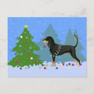 Cartes Pour Fêtes Annuelles Coonhound noir et tan décorant l'arbre de Noël