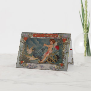 Cartes Pour Fêtes Annuelles Cupidon avec des pigeons dans un chariot.