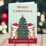 Cartes Pour Fêtes Annuelles Cute 2 Corgi sapin de Noël Chien personnalisé<br><div class="desc">Ces magnifiques corgi gallois de Pembroke ont la tête inclinée à l'intérieur d'un mignon casquette du Père Noël. Les deux petits sont assis devant un joli sapin de Noël orné de décorations colorées. Une belle carte de vacances corgis avec un magnifique dessin d'un duo de corgi rouge et blanc.</div>