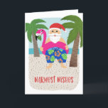 Cartes Pour Fêtes Annuelles Cute Funny Tropical Santa Christmas<br><div class="desc">Cette adorable carte de vacances présente une Père Noël tropicale dessinée à la main, portant des maillots de bain colorés et un flotteur fuchsia flamingo ! D'autres détails amusants comprennent des palmiers, l'océan et une plage de sable. Facile à customiser avec votre propre texte à l'avant et à l'intérieur de...</div>