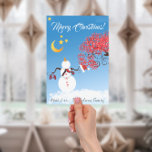 Cartes Pour Fêtes Annuelles Cute Snowman Regarde la Lune<br><div class="desc">Joli bonhomme de neige au-dessus d'un lot de monticule de neige. Tenant son casquette et des mitaines regardant vers le haut la lune d'or et les étoiles. Blue Sky et Red Tourbillonnant Branch Sucre de canne Tree rendent cette joyeuse carte de voeux de Noël et de Nouvel An adorable.</div>