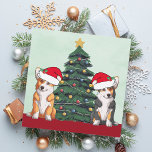 Cartes Pour Fêtes Annuelles Deux Corgi Christmas Tree Chien Santa Hat Cute<br><div class="desc">Ces magnifiques corgi gallois de Pembroke ont la tête inclinée à l'intérieur d'un mignon casquette du Père Noël. Les deux petits sont assis devant un joli sapin de Noël orné de décorations colorées. Une belle carte de vacances corgis avec un magnifique dessin d'un tricolore et une paire de corgi rouge...</div>
