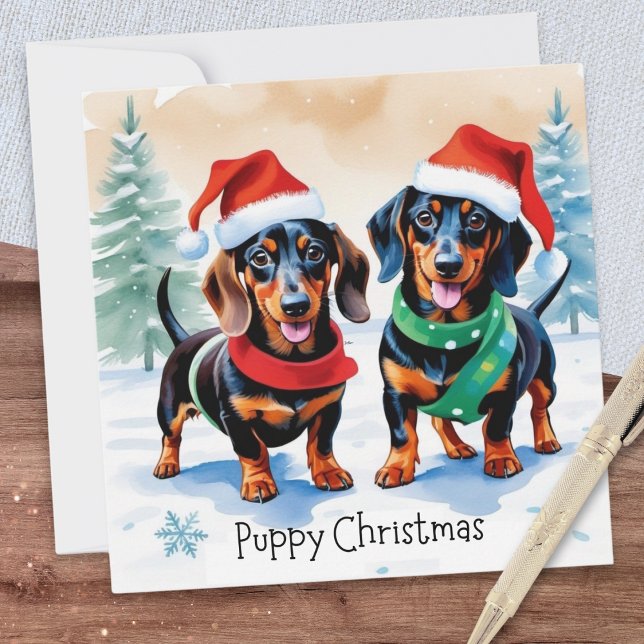 Cartes Pour Fêtes Annuelles Deux mignonnes chiots Dachshund Chien de compagnie (A Christmas card with illustration of two cute dachshund puppies and caption 'Puppy Christmas')
