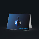 Cartes Pour Fêtes Annuelles Dreidel bleu brillant<br><div class="desc">Un rêve moderniste,  métallique,  bleu contre un arrière - plan sombre et nocturne. Deux des lettres hébraïques trouvées sur un dreidel,  une nonne et un shin,  brillent brillamment. Ajoutez votre propre texte.</div>