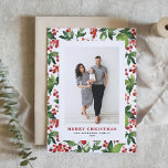 Cartes Pour Fêtes Annuelles Festive de verdure et de fraise Photo Noël<br><div class="desc">Joyeux Noël! Envoyez vos souhaits de vacances les plus chauds avec notre carte photo de Noël personnalisable, avec une belle aquarelle design de baies rouges d'hiver et de verdure luxuriante. Cette carte de Noël élégante vous permet de présenter votre photo préférée tout en ajoutant une touche personnelle à votre message...</div>