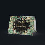Cartes Pour Fêtes Annuelles Gilded Greenery Black | Joyeuses Fêtes<br><div class="desc">Cette élégante carte de vœux de Noël présente une couronne encadrée de feuilles et de baies modernes peintes à l'aquarelle verte,  rouge et dorée avec une typographie tendance en faux or sur un fond noir moderne.</div>