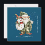 Cartes Pour Fêtes Annuelles Gnome et Snowman Joyeux Noël d'affaires Appartemen<br><div class="desc">Un gnome habillé de rouge se dresse à côté d'un bonhomme de neige dans un elfe vert, le casquette et le foulard rouge. Ils sont entourés d'une poussière de neige blanche qui s'opère sur l'arrière - plan bleu foncé. L'esthétique minimaliste est créée avec un simple Joyeux Noël ci-dessous et le...</div>