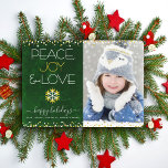 Cartes Pour Fêtes Annuelles Green Photo Peace Jove Love Snowflake Gold Modern<br><div class="desc">"Paix, joie et amour." Une illustration amusante, ludique, feuille d'or et flake blanc et typographie moderne sur un arrière - plan d'aquarelle en marbre vert foncé riche et profond vous aide à ouvrir la saison des fêtes, avec la photo personnalisée de votre choix. Faux feuille or et points confettis blancs...</div>