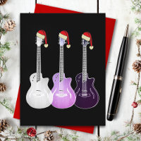 Guitares de Noël portant des chapeaux de Père Noël