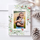 Cartes Pour Fêtes Annuelles Happy Holidays Photo Green Foliage Red Berries<br><div class="desc">Envoyez vos salutations de vacances en style avec cette belle carte avec votre photo entourée de verdure aquarelle et de baies rouges. Ajoutez votre salutation personnalisée et vos noms/année pour personnaliser. Elégant et chic,  mais simple et intemporel,  le design parfait pour des salutations joyeuses.</div>
