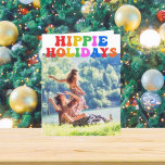 Cartes Pour Fêtes Annuelles Hippie Holidays Photo Jolie couleur Retro les anné<br><div class="desc">Les fêtes hippies. Customisez votre jolie carte de vacances hippie avec ce texte les années 70 funky dans des couleurs amusantes arc-en-ciel. Une carte pliée hippy de Noël colorée avec votre photo de famille vintage.</div>