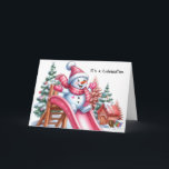 Cartes Pour Fêtes Annuelles Joueur de Snowman à Playground Pink<br><div class="desc">Découvrez l'esprit festif avec ce tableau charmant d'un bonhomme de neige moelleux orné d'accessoires roses, glissant joyeusement sur un toboggan rose vibrant au milieu d'une aire de jeux entourée d'arbres de Noël festonnés et d'une couverture de neige.</div>